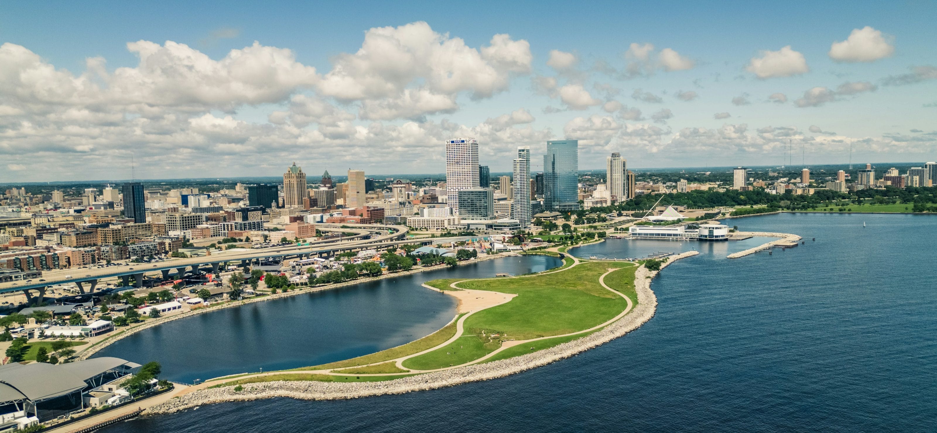 Aerial view of downtown Milwaukee and Lakeshore State Park on Lake Michigan